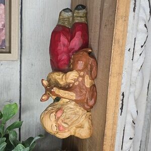 Enesco Lefever figurine, Santa Claus lying down and cuddling a deer